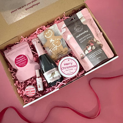 Cheers to Christmas gift box with Yellow Tail sparkling rosé, gingerbread, Rocky Road, Christmas candle and pamper treats