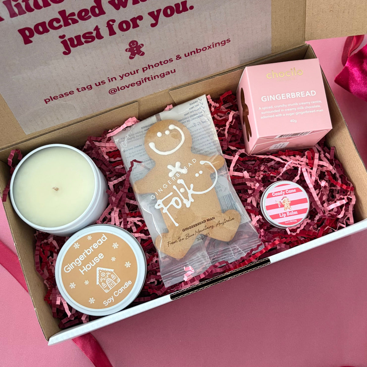 Gingerbread Kisses Christmas Gift Box with gingerbread house candle, gingerbread man, chocolates and peppermint lip balm