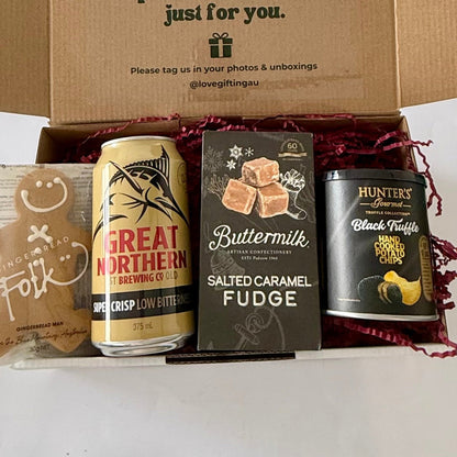 Men's Christmas beer and treats gift box with Great Northern beer, salted caramel fudge, black truffle chips and gingerbread by Love Gifting.