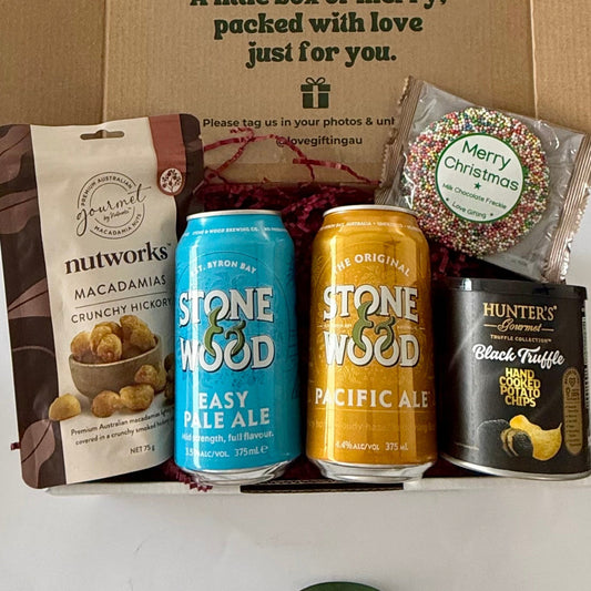 Christmas Brews & Bites Stone & Wood beer gift box with Pacific Ale, Easy Pale Ale, Nutworks Hickory Macadamias, Hunter's Black Truffle Chips and Christmas chocolate freckle.