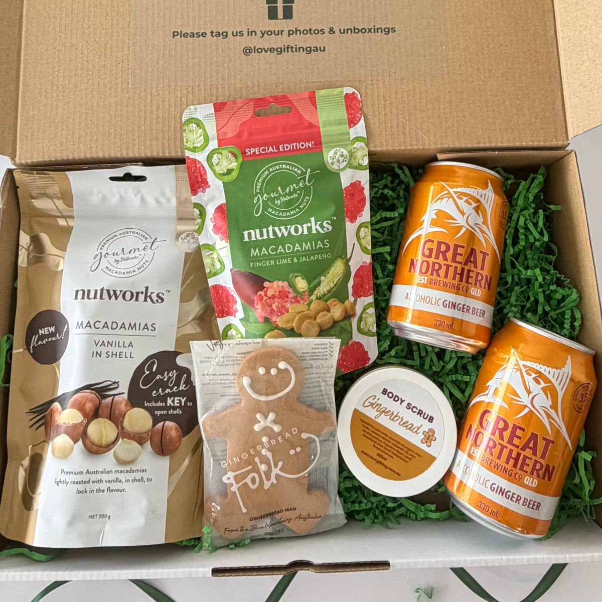 Men's Christmas gift box with Great Northern alcoholic ginger beer, Nutworks macadamias, gingerbread man and gingerbread body scrub.