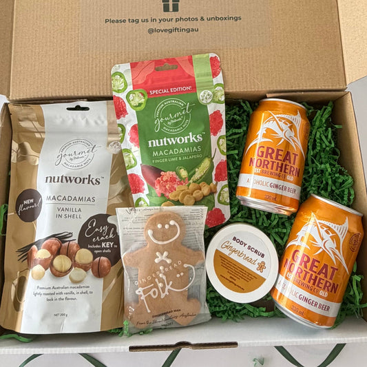 Men's Christmas gift box with Great Northern alcoholic ginger beer, Nutworks macadamias, gingerbread man and gingerbread body scrub.